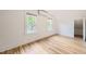 Bright bedroom featuring hardwood floors, two windows and ample natural light at 1519 16Th St, Boulder, CO 80302