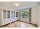 Bright bedroom with large window, hardwood floors, and built-in storage cabinets at 1519 16Th St, Boulder, CO 80302