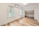 Bright bedroom featuring hardwood floors, two windows and a walk-in closet at 1519 16Th St, Boulder, CO 80302
