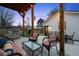 Beautiful back patio featuring comfortable seating and grill, perfect for outdoor entertaining and relaxation at 2948 S Clarkson St, Englewood, CO 80113