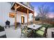 Backyard patio with an outdoor dining area and a grill, perfect for entertaining at 2948 S Clarkson St, Englewood, CO 80113