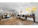Open-concept living area with hardwood floors, modern decor, and an inviting atmosphere at 2948 S Clarkson St, Englewood, CO 80113