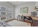 Bright home office with hardwood floors, desk and walk out access at 2948 S Clarkson St, Englewood, CO 80113