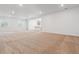 Unfinished basement with carpeted floor, recessed lighting, and a view of the kitchen at 8686 Pennycress Dr, Littleton, CO 80125