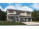 Two story home with gray siding, two car garage, and landscaping at 8686 Pennycress Dr, Littleton, CO 80125