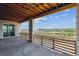 Outdoor patio with concrete floors offers spectacular views of the surrounding landscape at 8686 Pennycress Dr, Littleton, CO 80125