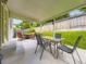 This covered patio offers a perfect blend of comfort and style for all your outdoor entertainment needs at 5456 E Briarwood Pl, Centennial, CO 80122