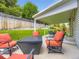 Relax on this covered patio with comfortable seating, perfect for outdoor gatherings and enjoying the serene backyard at 5456 E Briarwood Pl, Centennial, CO 80122