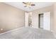 Comfortable bedroom features carpet floors, closet, and neutral walls, perfect for relaxation at 19722 W 59Th Ave, Golden, CO 80403