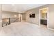 Upstairs hallway provides access to a bathroom and features plush carpeting and neutral color palette at 19722 W 59Th Ave, Golden, CO 80403