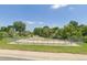 Outdoor rink in a park with a fence, benches, trees, and green grass around it at 19722 W 59Th Ave, Golden, CO 80403