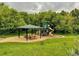 A park featuring a covered picnic area, playground, mature trees and grassy fields at 19722 W 59Th Ave, Golden, CO 80403