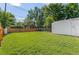 Spacious backyard featuring green lawn, and fencing at 740 Cherry St, Denver, CO 80220