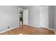 Bedroom with hardwood floors and neutral walls at 740 Cherry St, Denver, CO 80220