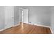 Bedroom featuring hardwood floors and white trim at 740 Cherry St, Denver, CO 80220