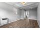 Bedroom featuring wood floors and bright light at 740 Cherry St, Denver, CO 80220
