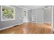 Cozy living room with polished hardwood floors and built-in shelving at 740 Cherry St, Denver, CO 80220