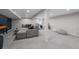 Spacious basement featuring an open floor plan, comfortable seating area, and carpeted floors at 10743 W Turtle Mtn, Littleton, CO 80127