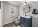 Bright bathroom with updated vanity, modern fixtures, and natural light from window at 10743 W Turtle Mtn, Littleton, CO 80127