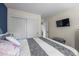 Bright bedroom with large closet and wall-mounted television at 10743 W Turtle Mtn, Littleton, CO 80127