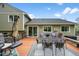 A large deck area, perfect for outdoor dining and entertaining, includes a large table at 10743 W Turtle Mtn, Littleton, CO 80127