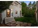 A well-maintained private backyard with grass and stone walkway leading to the modern home's entrance at 2523 N Humboldt St, Denver, CO 80205