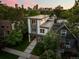 A modern home blends seamlessly with its surroundings, offering a stylish and comfortable living space at 2523 N Humboldt St, Denver, CO 80205