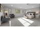 Spacious main bedroom features ample natural light from large windows, and stylish seating area at 2523 N Humboldt St, Denver, CO 80205