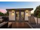 Charming rooftop deck with stylish seating and elegant lighting for evening enjoyment at 2523 N Humboldt St, Denver, CO 80205