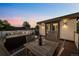 Relax on the cozy rooftop deck with an outdoor sectional, perfect for entertaining with a bottle of wine at 2523 N Humboldt St, Denver, CO 80205