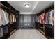 Large walk-in closet with custom shelving and ample storage space for clothes and accessories at 2523 N Humboldt St, Denver, CO 80205