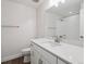 Modern bathroom featuring a large mirror, bright lighting, and a shower/tub combo at 4735 Twelve Oaks Way, Castle Rock, CO 80104