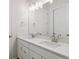 Elegant bathroom featuring a double sink vanity, modern fixtures and ample counter space at 4735 Twelve Oaks Way, Castle Rock, CO 80104