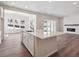 Open-concept living area featuring hardwood floors and a seamless flow to other living spaces at 4735 Twelve Oaks Way, Castle Rock, CO 80104
