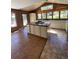 Open kitchen with center island, ample counter space, and natural light at 28650 Cavan Ln, Evergreen, CO 80439