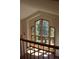 Bright living room with large windows offering views of the lush surrounding greenery and natural light at 28650 Cavan Ln, Evergreen, CO 80439