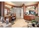 Luxurious bathroom features dual vanities, walk-in shower, and elegant fixtures for a spa-like experience at 9188 Buck Hill Dr, Highlands Ranch, CO 80126