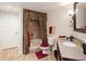 Updated bathroom with ornate vanity, shower-tub combo, and designer decor makes for a stylish bathroom at 9188 Buck Hill Dr, Highlands Ranch, CO 80126