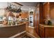 Gourmet kitchen featuring custom cabinetry, granite countertops, and stainless steel appliances at 9188 Buck Hill Dr, Highlands Ranch, CO 80126