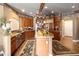 A kitchen featuring wooden floors, matching cabinets, an island, and elegant decor at 9188 Buck Hill Dr, Highlands Ranch, CO 80126