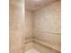 Inviting tiled steam room with a granite bench, perfect for relaxation and personal spa days at 9188 Buck Hill Dr, Highlands Ranch, CO 80126