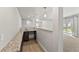 Granite countertop and storage in the finished basement bar area at 16838 Greyhawk Dr, Monument, CO 80132