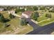 Aerial view of the property showcasing a detached garage, long driveway, and fenced yard at 42340 Kingsmill Cir, Elizabeth, CO 80107