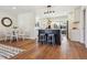 Modern kitchen with island, stainless steel appliances, and white shaker cabinets at 17200 W 15Th Ave, Golden, CO 80401