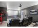 Home theater with comfortable seating and a large projection screen for movie nights at 223 Castlemaine Ct, Castle Rock, CO 80104