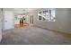 Open-concept living room offering lots of natural light and easy access to the kitchen at 342 Olympia Ave, Longmont, CO 80504