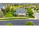 A lovely aerial shot of property with mature trees and lush lawn nestled in a peaceful residential neighborhood at 8267 S Sicily Ct, Aurora, CO 80016