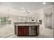 Stylish kitchen featuring a breakfast bar, stainless steel appliances, and an open layout for easy entertaining at 8267 S Sicily Ct, Aurora, CO 80016