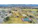 Aerial view featuring neighborhood park with playground, tennis courts and walking trails at 3090 W 107Th Pl # F, Westminster, CO 80031