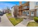 Charming multi-level home showcasing a well-kept lawn and cozy upper balcony at 3090 W 107Th Pl # F, Westminster, CO 80031